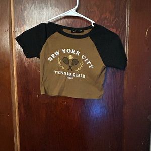 Baby Tee. Worn a few times. Too small for me.